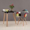 Multicolor Trendy Cushion Lounge Chair featuring vibrant, multicolored cushions and a modern design, perfect for adding style and comfort to lounges and casual spaces.