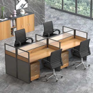 Modern 4-way office desk system with glass partitions, drawers for storage, and integrated grommets for cable management.