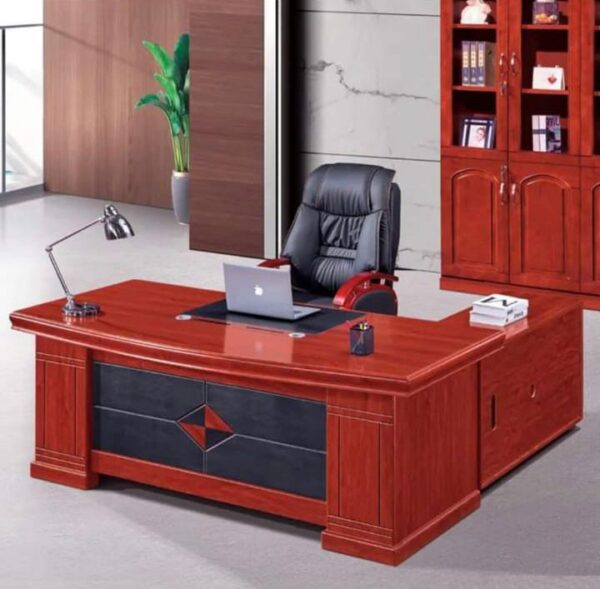 1600mm mahogany office desk with a large work surface, sturdy engineered wood construction, and a modern geometric front panel design.