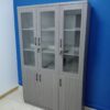 3-door grey wooden filing cabinet with ample storage space and a sleek, modern design for organizing office documents and supplies.