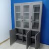 3-door grey wooden filing cabinet with ample storage space and a sleek, modern design for organizing office documents and supplies.