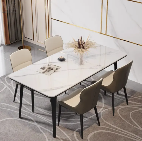 4-seater dining table set with a marble-finish tabletop and soft upholstered chairs, designed for modern dining spaces.