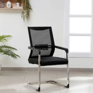 Mesh Office Visitor's Chair with black seat and chrome legs in a modern office setting.