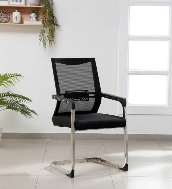 Mesh Office Visitor's Chair with black seat and chrome legs in a modern office setting.