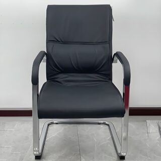 Executive leather visitor's seat with plush cushioning and a sturdy metal frame, ideal for office environments.