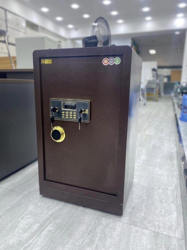 Digital Safe Box with Dual Authentication placed in a modern office setting, showcasing its sleek design and durable build.