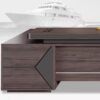 Modern L-shaped executive desk with integrated storage, perfect for efficient workspace.