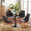Modern 5-piece dining set with a round pedestal table and four Eames-style chairs, perfect for kitchens, dining rooms, and coffee areas.