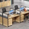 4-way brown office workstation with individual glass partitions and built-in drawer units for efficient workspace organization.