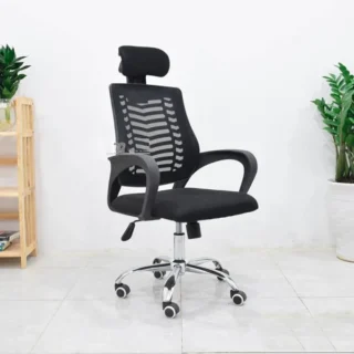 Ergonomic Mesh Office Chair with Adjustable Headrest, breathable mesh back, and sturdy five-star base, ideal for extended work hours.