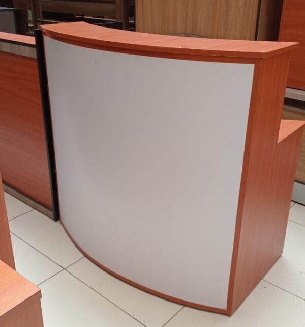 1.6M curved modern reception desk with a strong metal frame and cherry finish, perfect for professional lobbies and offices.