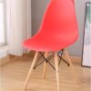 Colorful Plastic Eames Style Chairs with wooden legs in green, pink, blue, orange, and black, perfect for dining or office use.