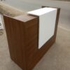 1400mm Office Reception Desk with wood finish, raised counter, and lockable drawers.