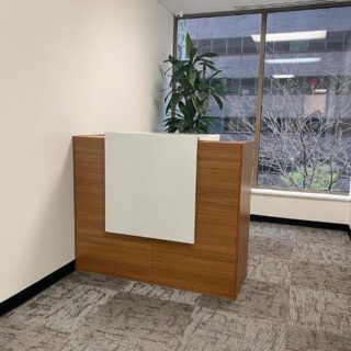 1400mm Custom Reception Desk with wood-grain finish and white accent, ideal for professional reception areas.