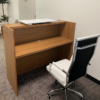 1400mm Custom Reception Desk with wood-grain finish and white accent, ideal for professional reception areas.