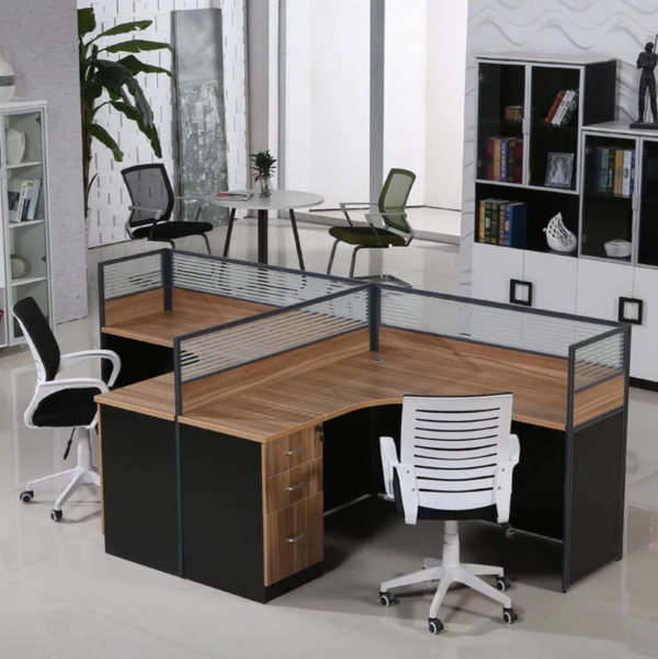 Modern L-Shaped Computer Desk with granulated wood surface and transparent sunlight panel in an office setup.