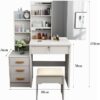 White dressing table with mirror, drawers, and open shelves, perfect for modern bedroom storage.