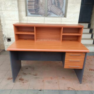 Stylish Reception Office Desk with spacious work surface and built-in storage compartments.