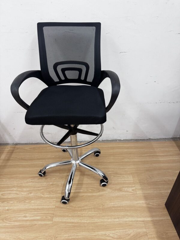 Ergonomic mesh reception chair with adjustable height, footrest, and lumbar support.